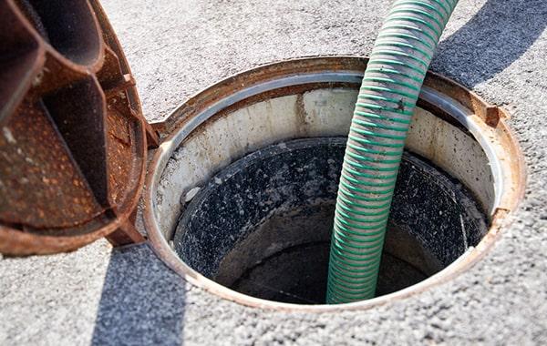 regular grease trap pumping services help prevent grease and food particles from entering the sewer system and causing contamination